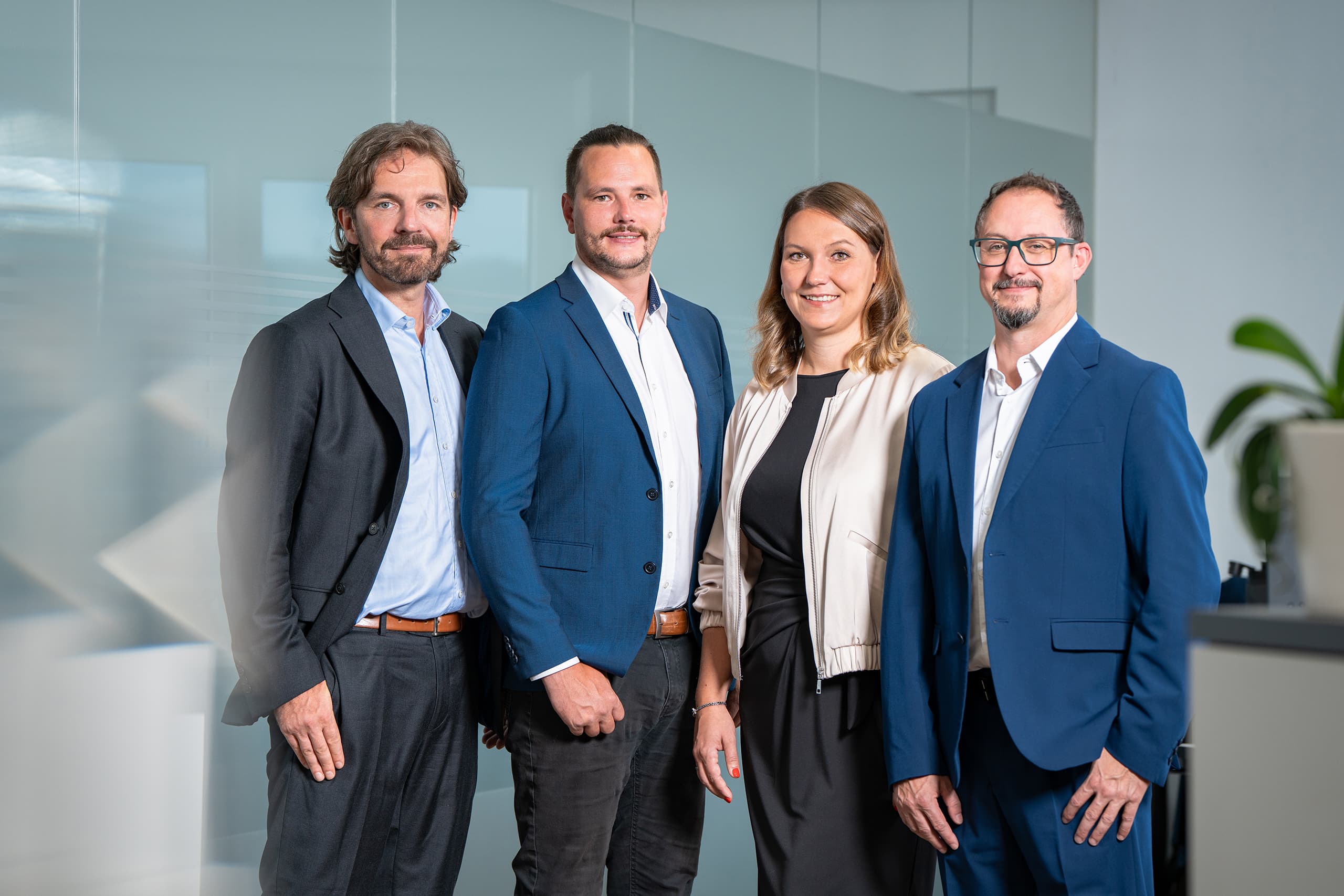 Team der HecknerGroup im Büro